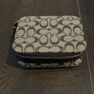 Coach travel pill case with 2 mini bottles